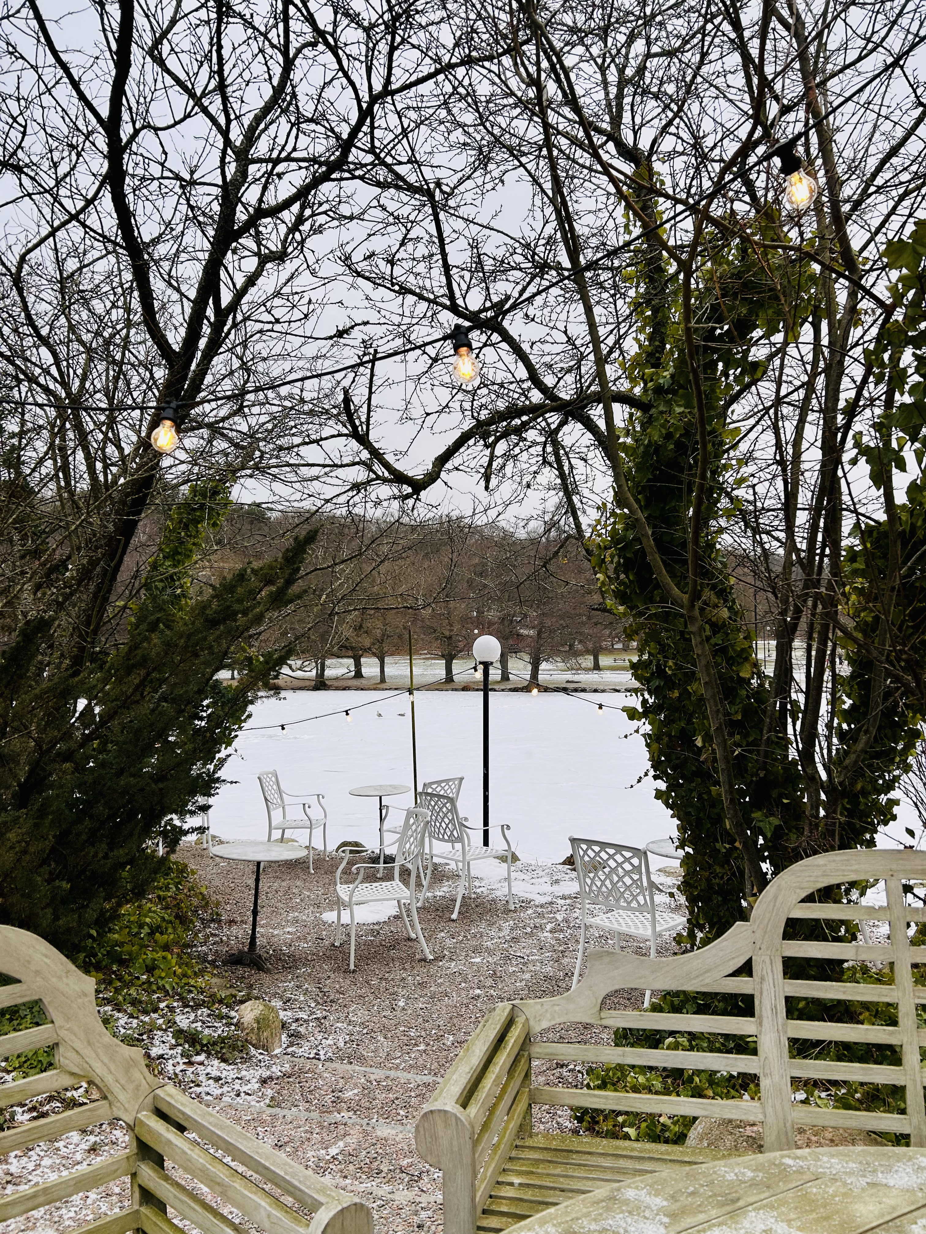 Empty outdoor seating area in Slottsskogen in winter