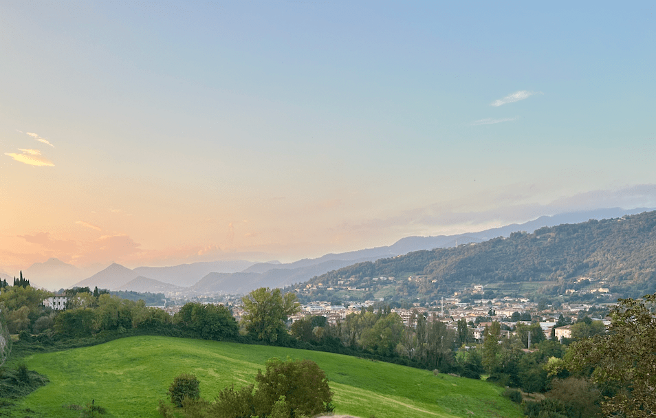Panoramic view of Bergamo and surrounding hills at sunset, Lombardy, Italy